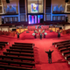 Reverend Dr. Alyn E. Waller, bottom right, leads his three-member choir from the main aisle of an empty Enon Tabernacle, during the church’s live streaming Easter Sunday Service in Philadelphia, Sunday, April 12, 2020.